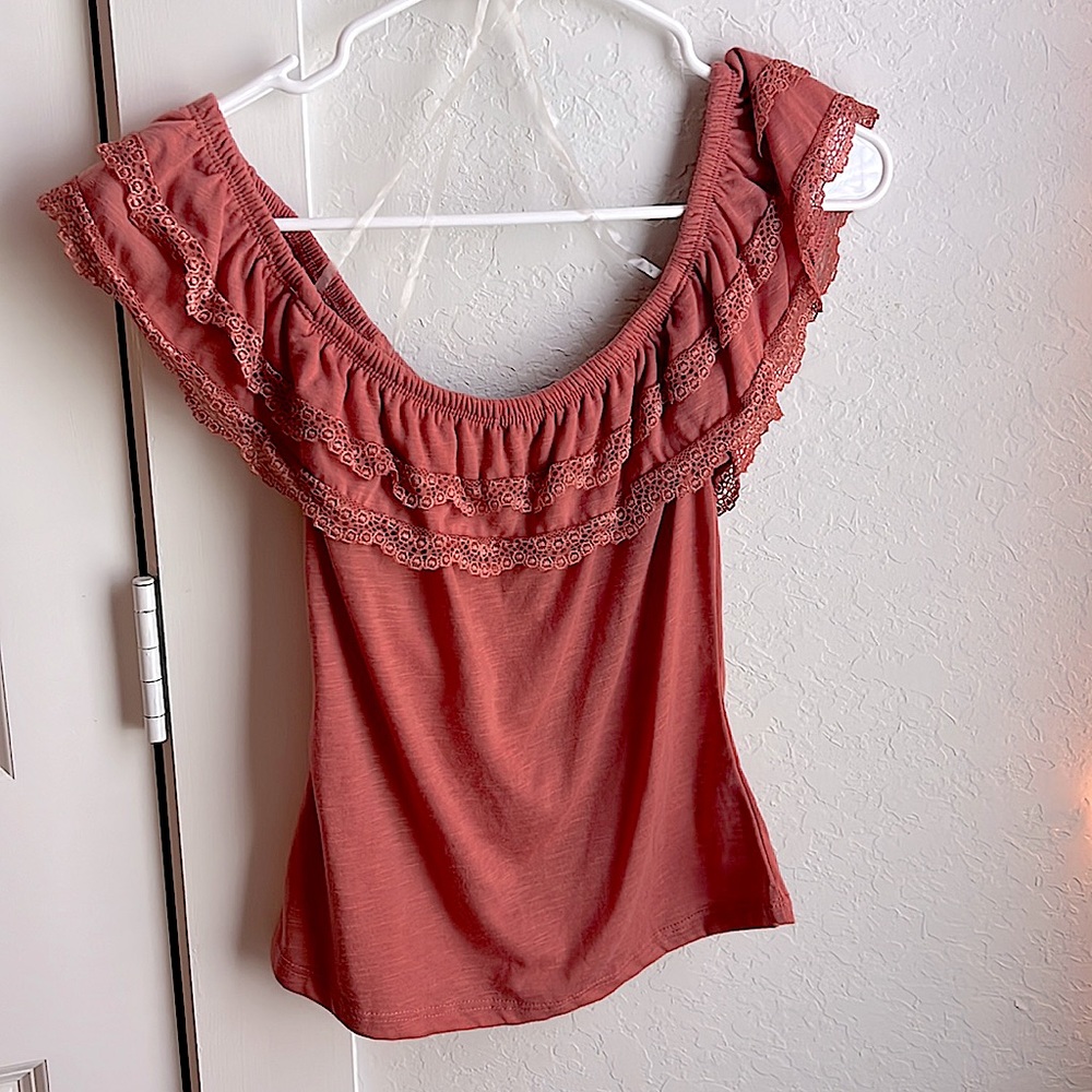 This rue 21 top is pink and drops at the shoulders!